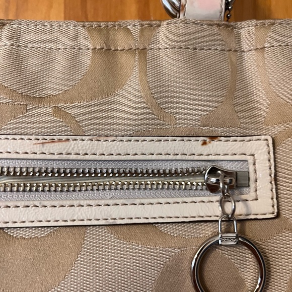Larger Coach tote- has blemishes pictured on handles. Make up stain on the insid - Picture 4 of 5